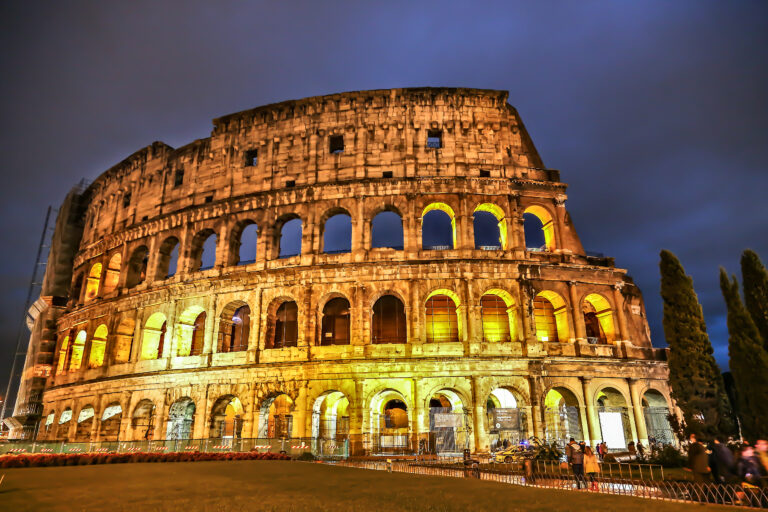 A picutre of the Colosseum in Rome at night