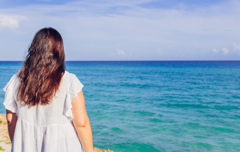 woman looking at the sea on holiday in varadero